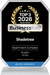 Shadetree Apartments with Award plaque for Shadetree, a top 3 apartment complex in Ruskin, Florida, for 2026 from Business Rate.