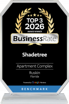 Shadetree Apartments with Award plaque for Shadetree, a top 3 apartment complex in Ruskin, Florida, for 2026 from Business Rate.